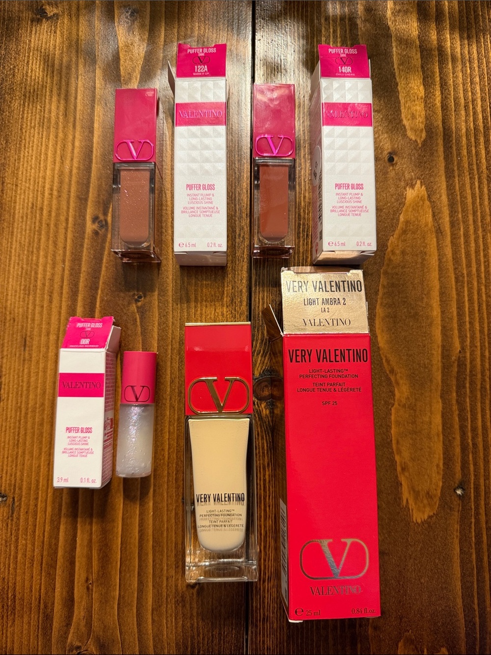Valentino Lip Gloss & Foundation Set with 2 full size puffers and 1 mini puffer.